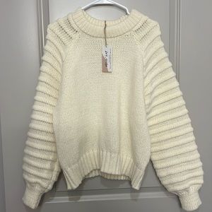 Cream colored knit sweater